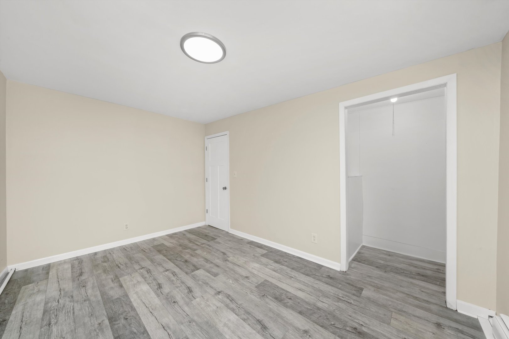 4218 Home Avenue Stickney, IL 60402 - Photo 17 of 35 a view of an empty room with wooden floor