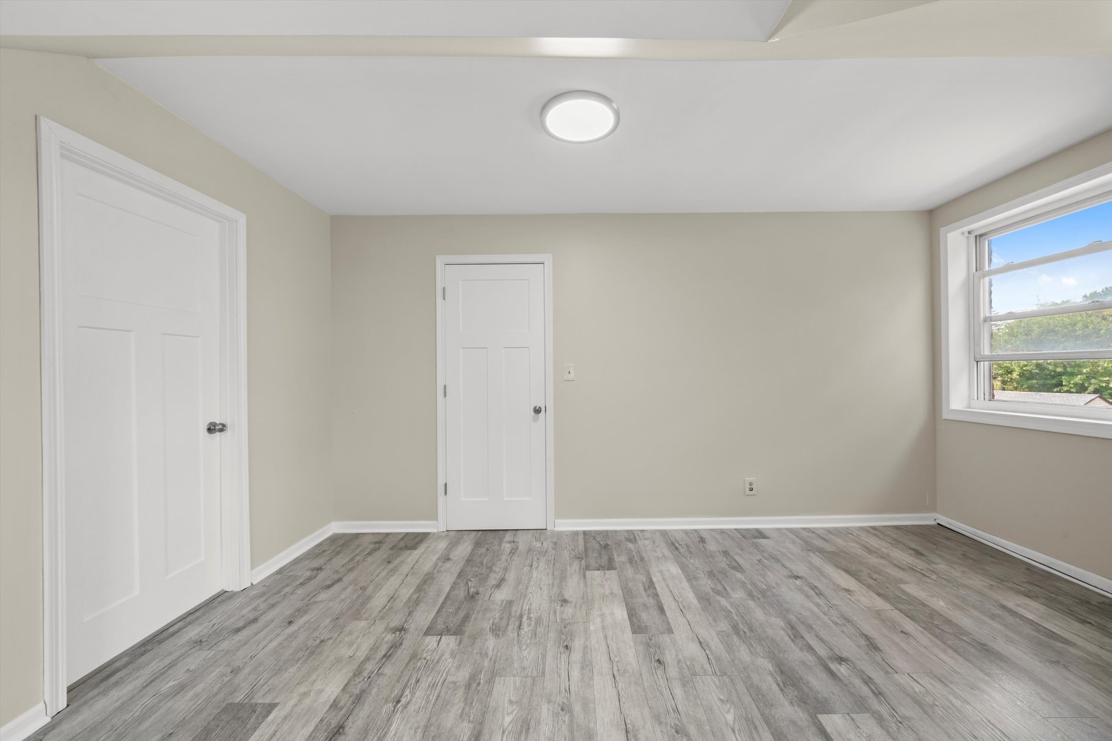 4218 Home Avenue Stickney, IL 60402 - Photo 20 of 35 a view of room with window and wooden floor