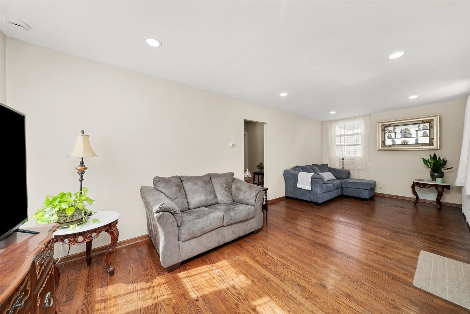4218 Home Avenue Stickney, IL 60402 - Photo 2 of 35 a living room with furniture and a table