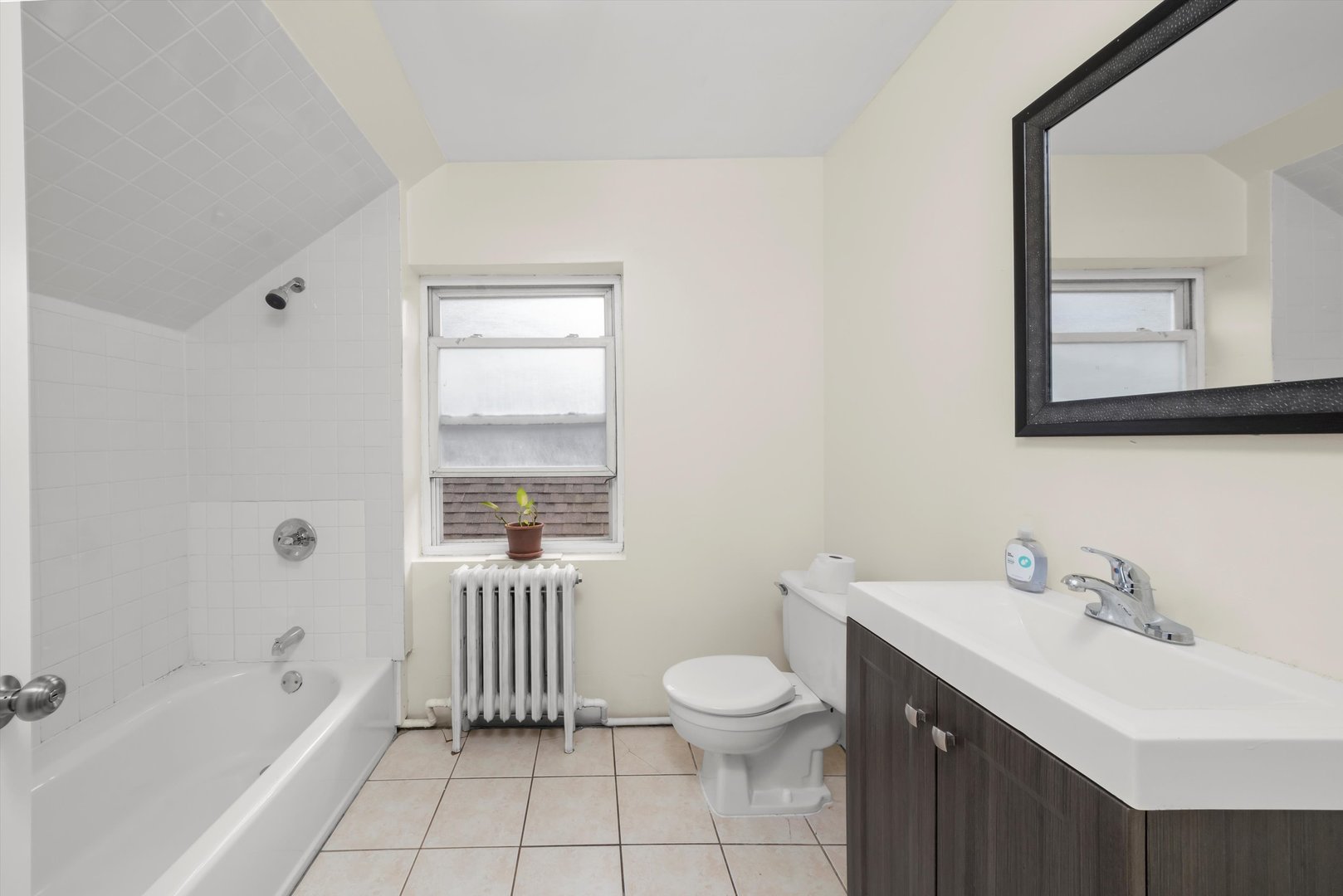 4218 Home Avenue Stickney, IL 60402 - Photo 21 of 35 a bathroom with a sink a toilet and bathtub