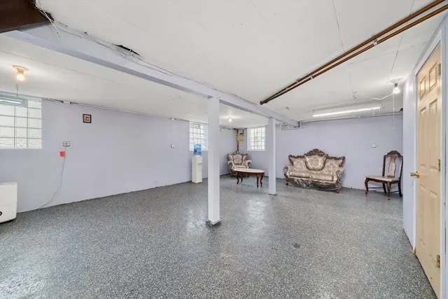 a view of a livingroom with table and chair