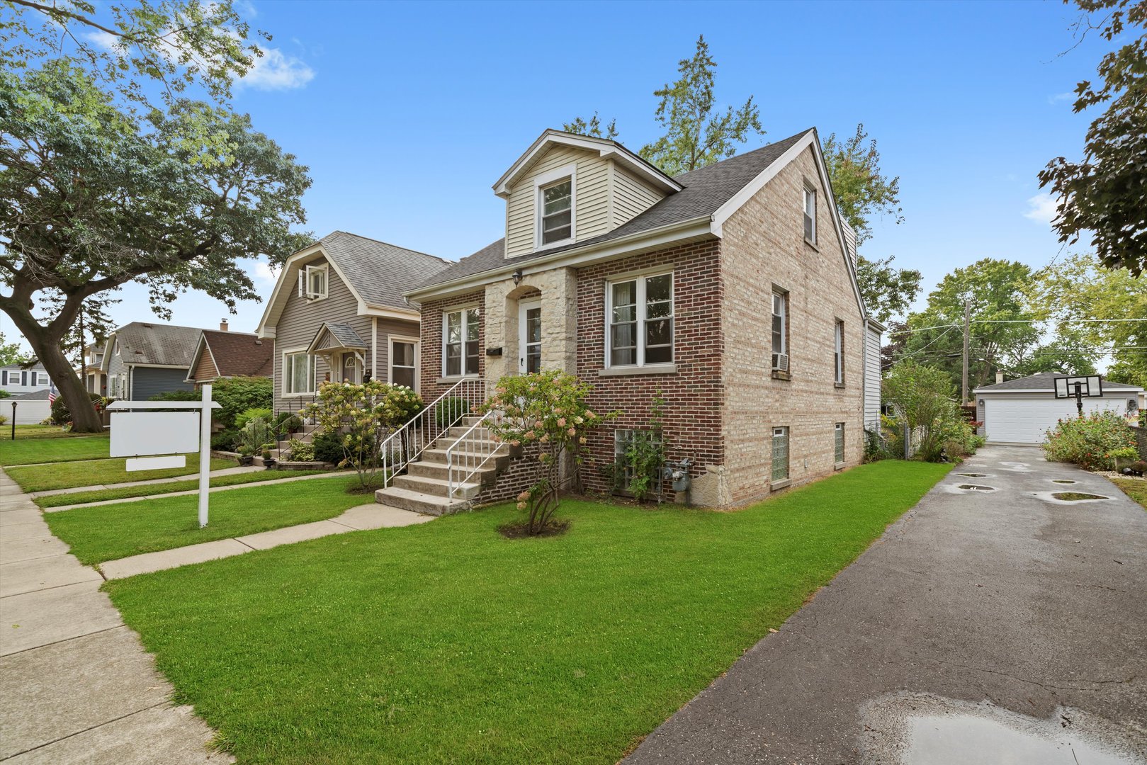 4218 Home Avenue Stickney, IL 60402 - Photo 24 of 35 a front view of a house with a yard