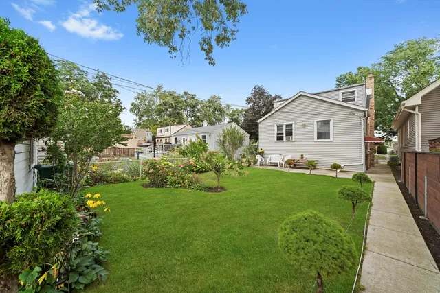 a view of a house with a garden