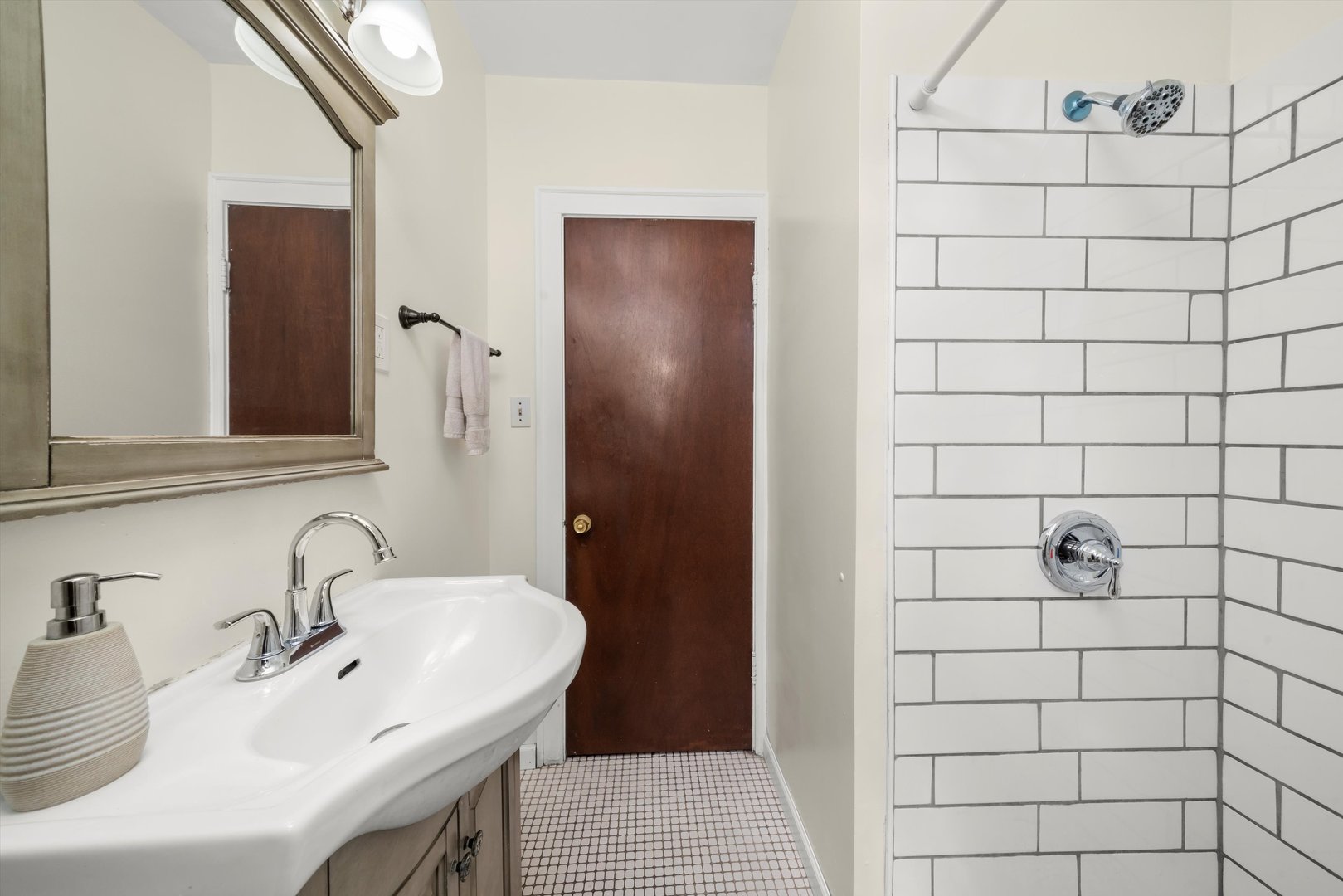 4218 Home Avenue Stickney, IL 60402 - Photo 9 of 35 a bathroom with a sink and a mirror