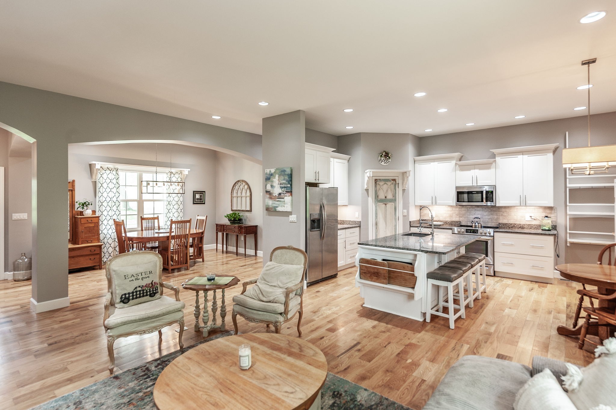 8338 Guthrie Road Cross Plains, TN 37049 - Photo 11 of 43 a living room with stainless steel appliances furniture and a kitchen view