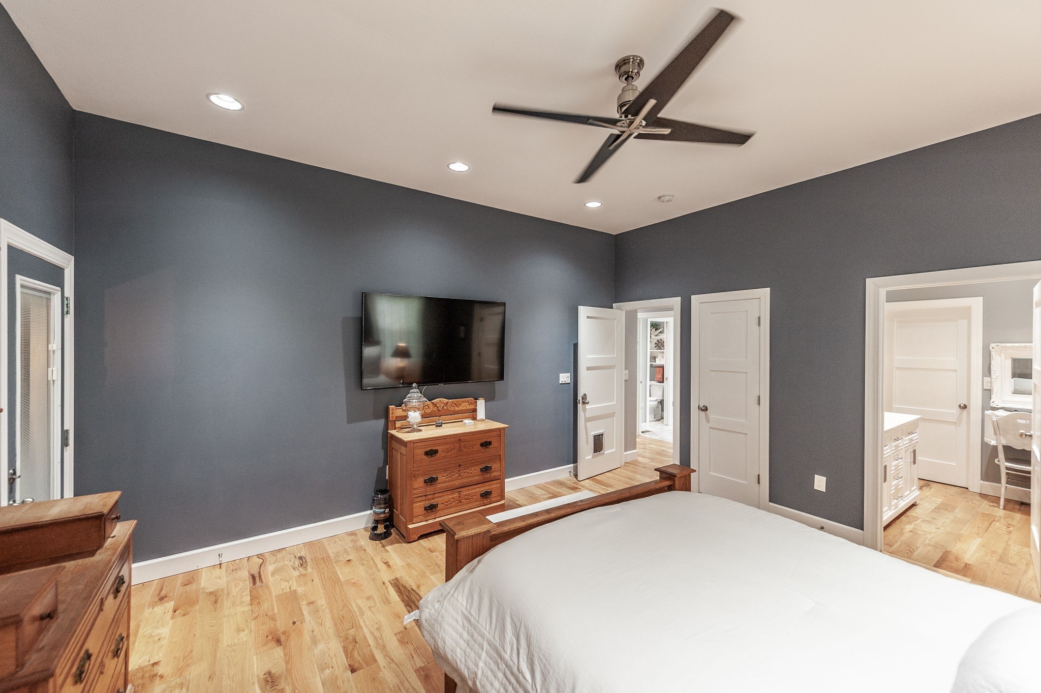 8338 Guthrie Road Cross Plains, TN 37049 - Photo 17 of 43 a bedroom with a bed and a flat screen tv