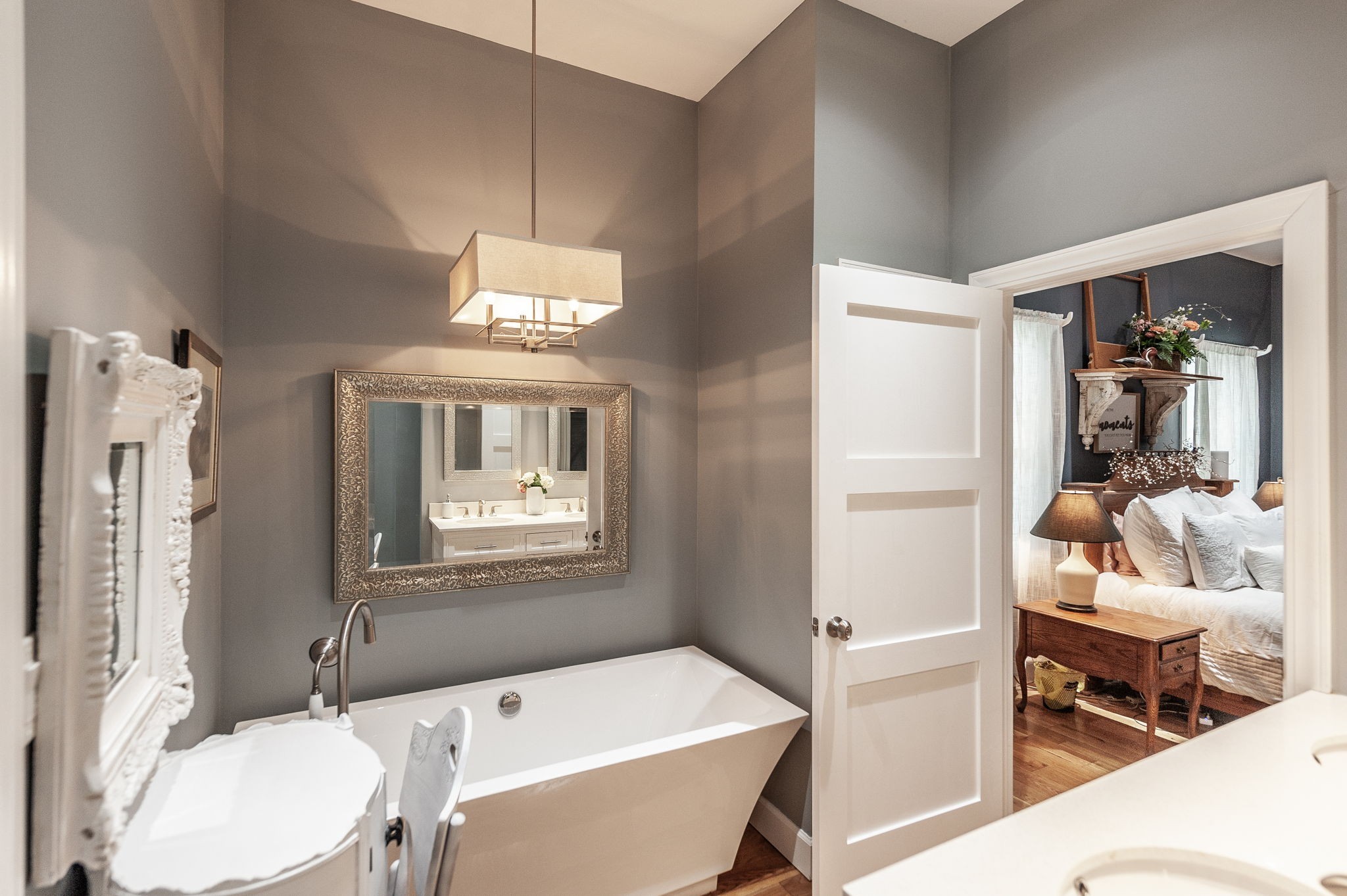 8338 Guthrie Road Cross Plains, TN 37049 - Photo 19 of 43 a bathroom with a sink a toilet a mirror and shower