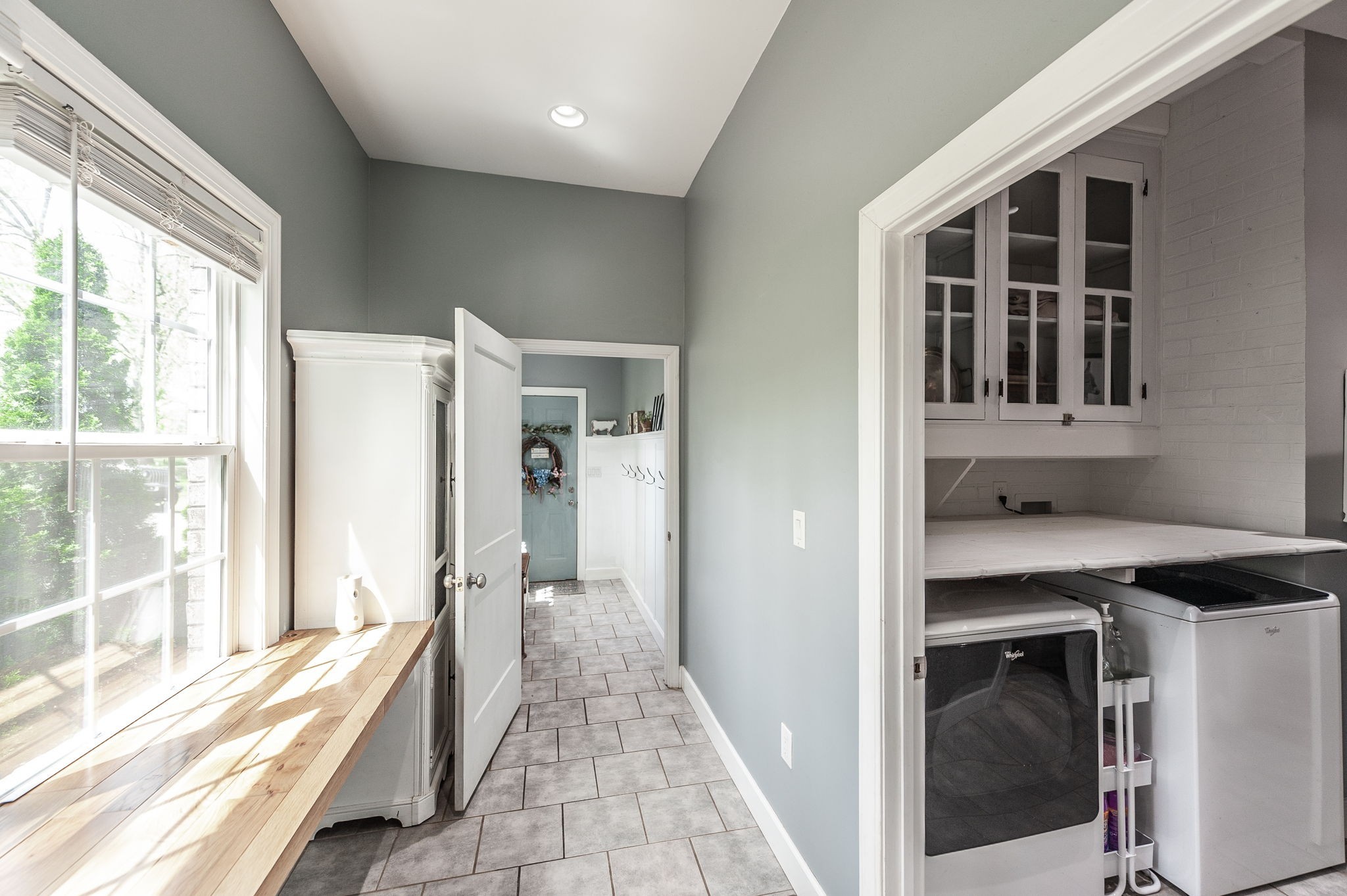 8338 Guthrie Road Cross Plains, TN 37049 - Photo 22 of 43 a hallway with a large window and a kitchen view