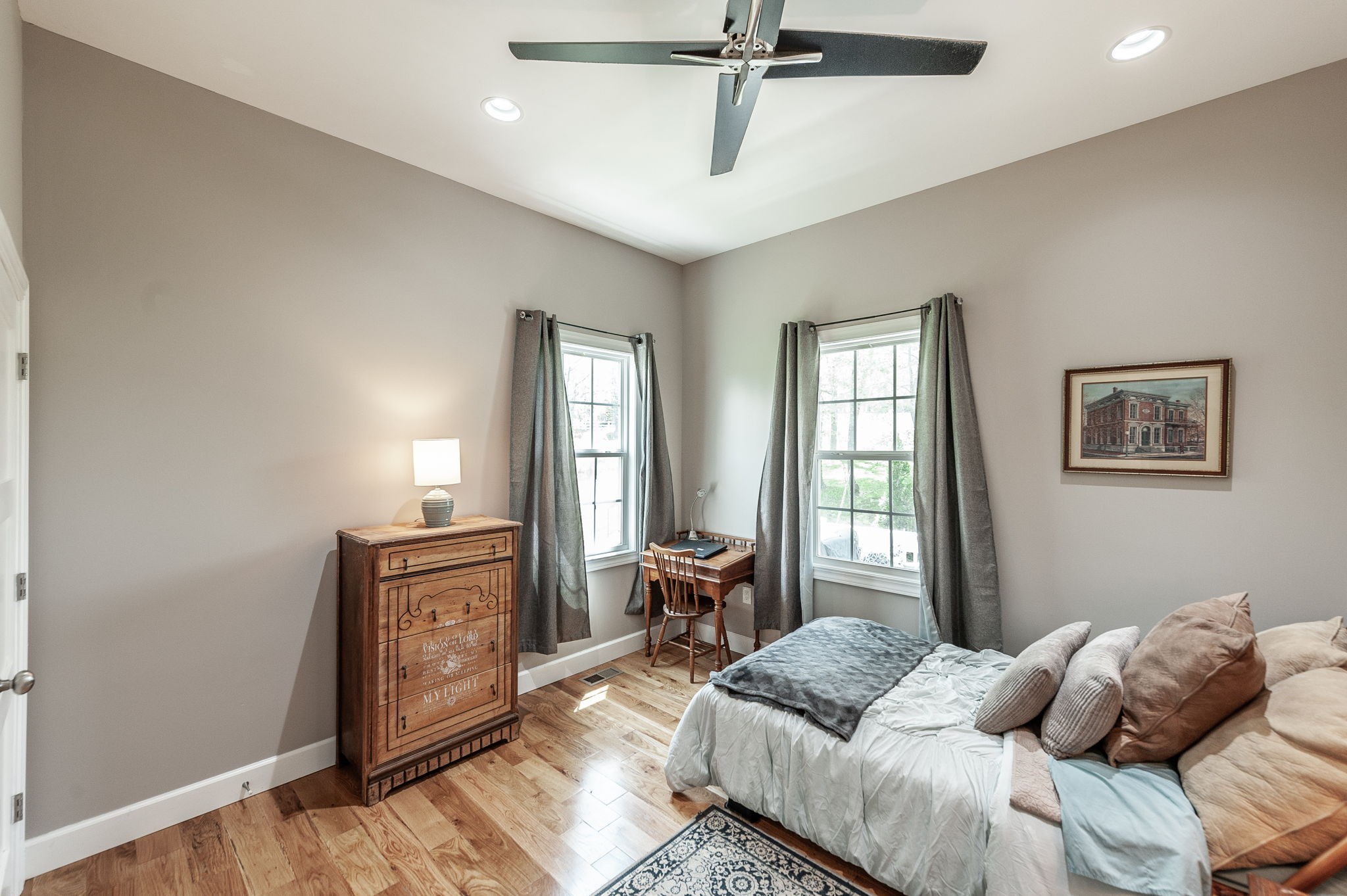 8338 Guthrie Road Cross Plains, TN 37049 - Photo 27 of 43 a bedroom with a bed and wooden floor
