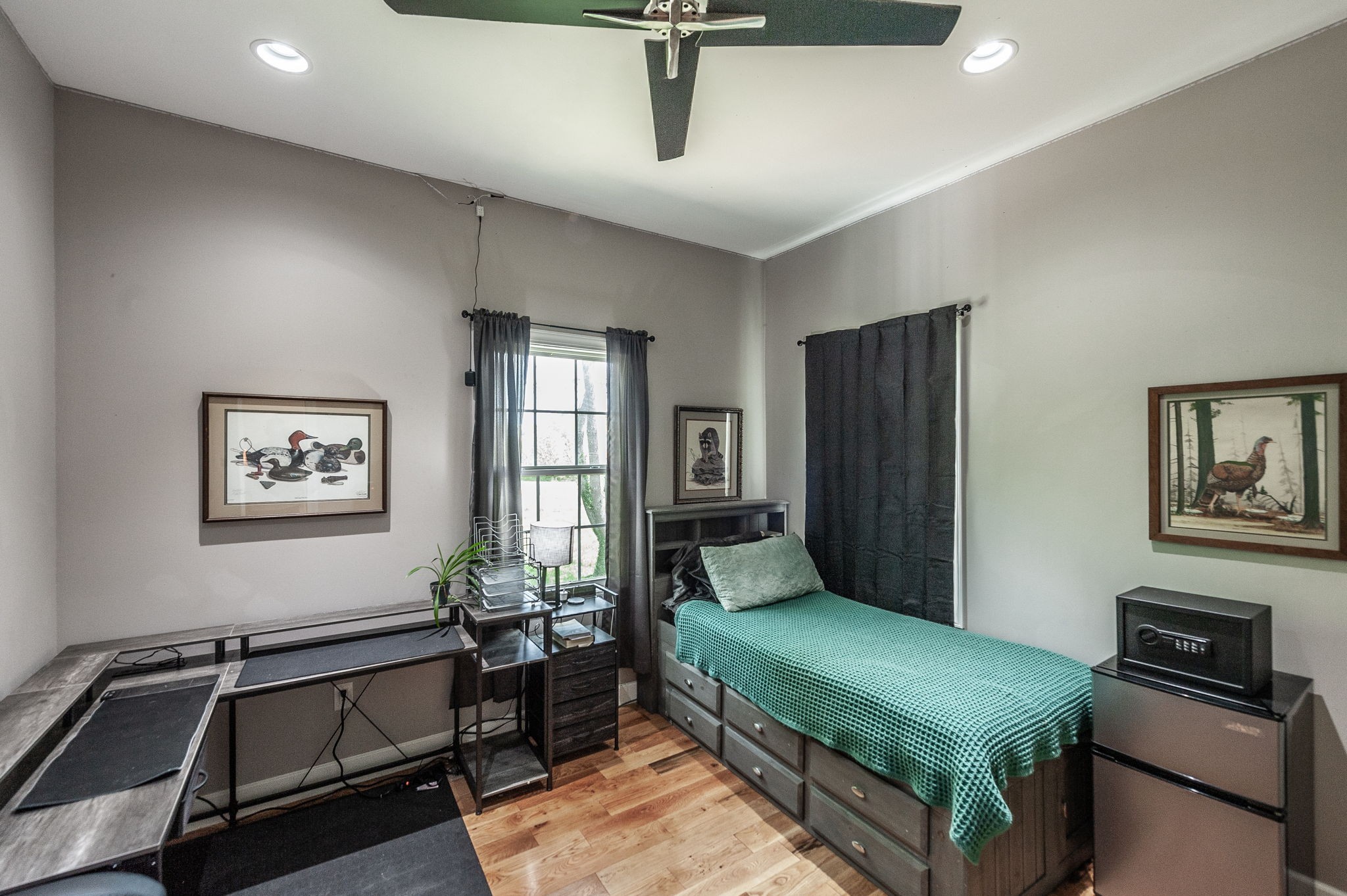 8338 Guthrie Road Cross Plains, TN 37049 - Photo 30 of 43 a bedroom with a bed next to a window