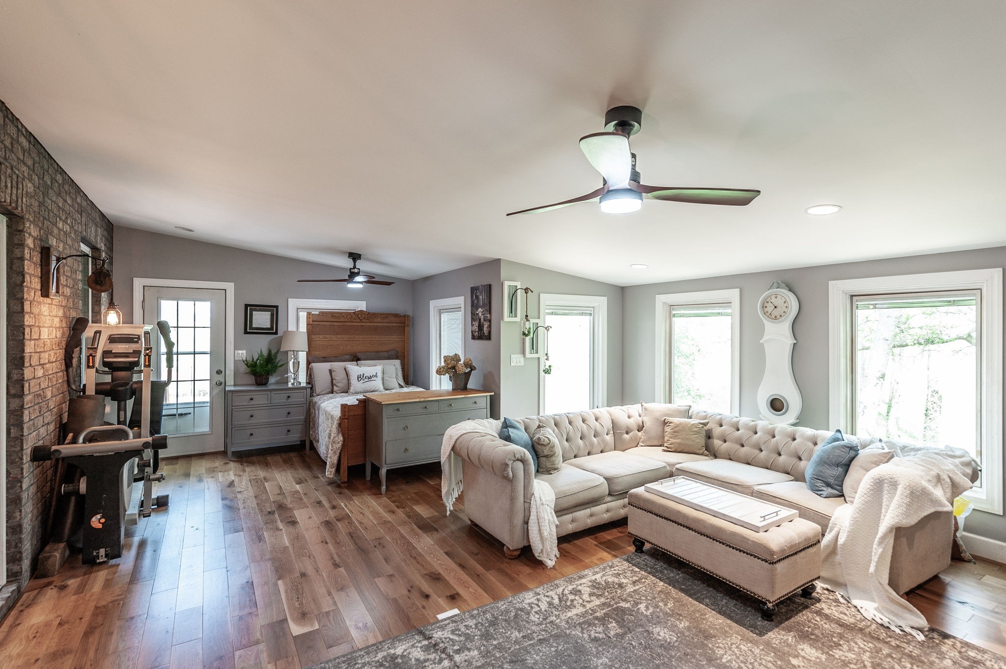 8338 Guthrie Road Cross Plains, TN 37049 - Photo 31 of 43 a living room with furniture a ceiling fan a rug and a window