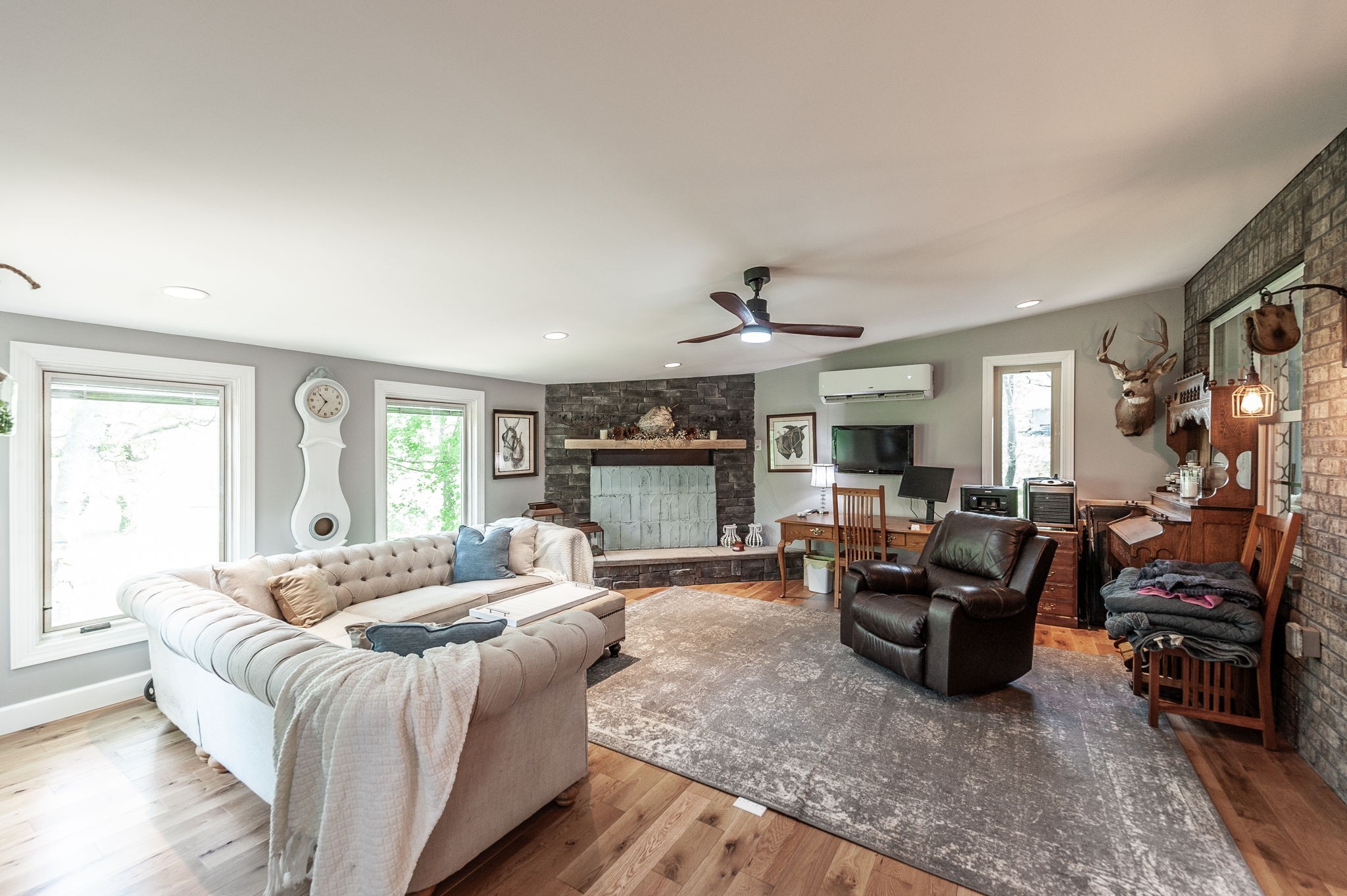 8338 Guthrie Road Cross Plains, TN 37049 - Photo 32 of 43 a living room with furniture large window and flat screen tv