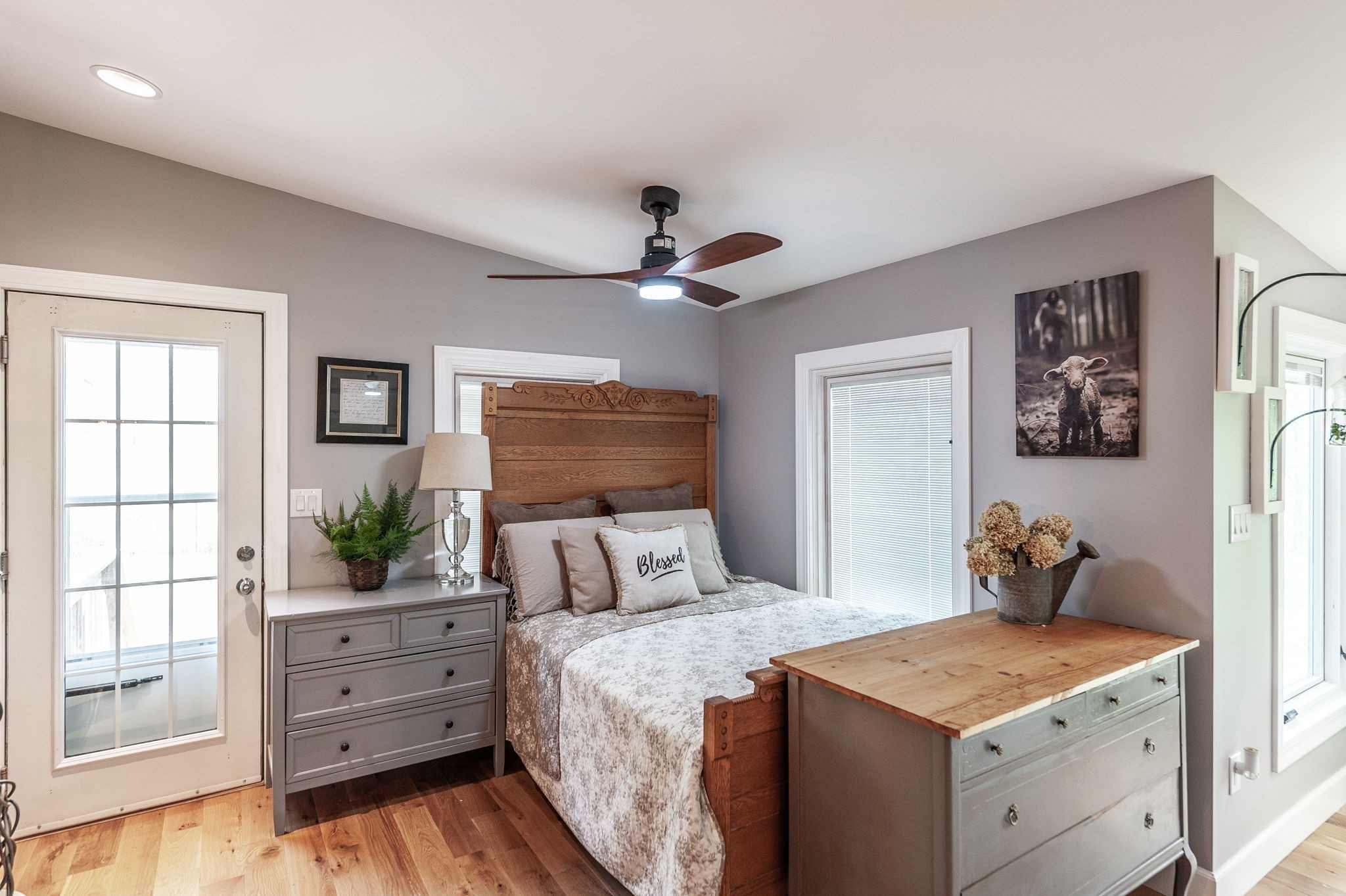 8338 Guthrie Road Cross Plains, TN 37049 - Photo 34 of 43 a bedroom with a bed and a potted plant on the dresser
