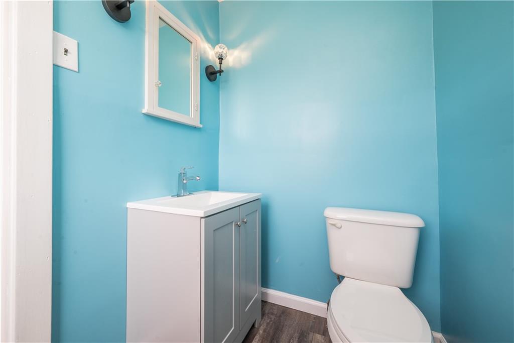 10780 Old Trail Road Irwin, PA 15642 - Photo 25 of 45 a bathroom with a toilet a sink and a mirror