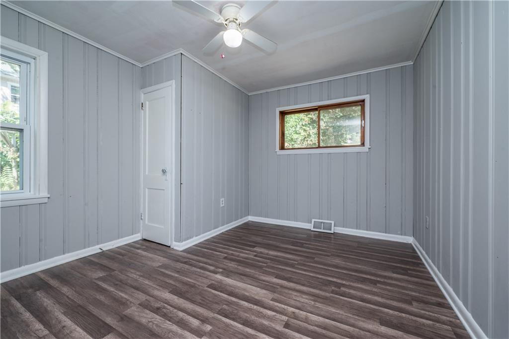10780 Old Trail Road Irwin, PA 15642 - Photo 30 of 45 a view of an empty room with wooden floor and a window