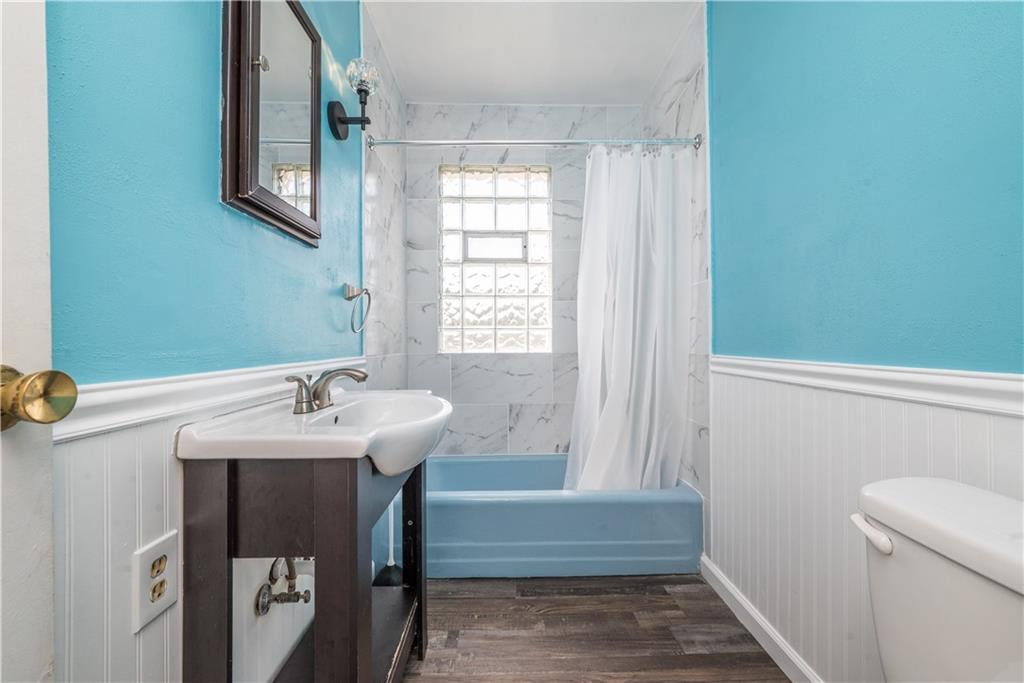 10780 Old Trail Road Irwin, PA 15642 - Photo 34 of 45 a bathroom with a sink a toilet and tub