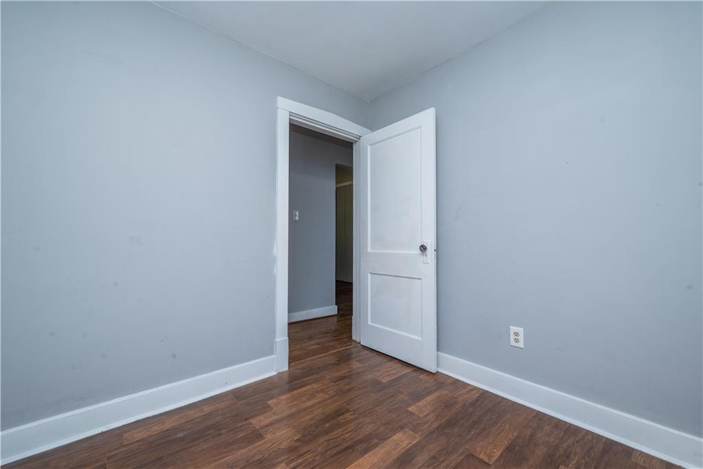 10780 Old Trail Road Irwin, PA 15642 - Photo 37 of 45 a view of an empty room with wooden floor