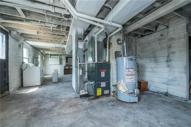 a view of a hallway with seating area