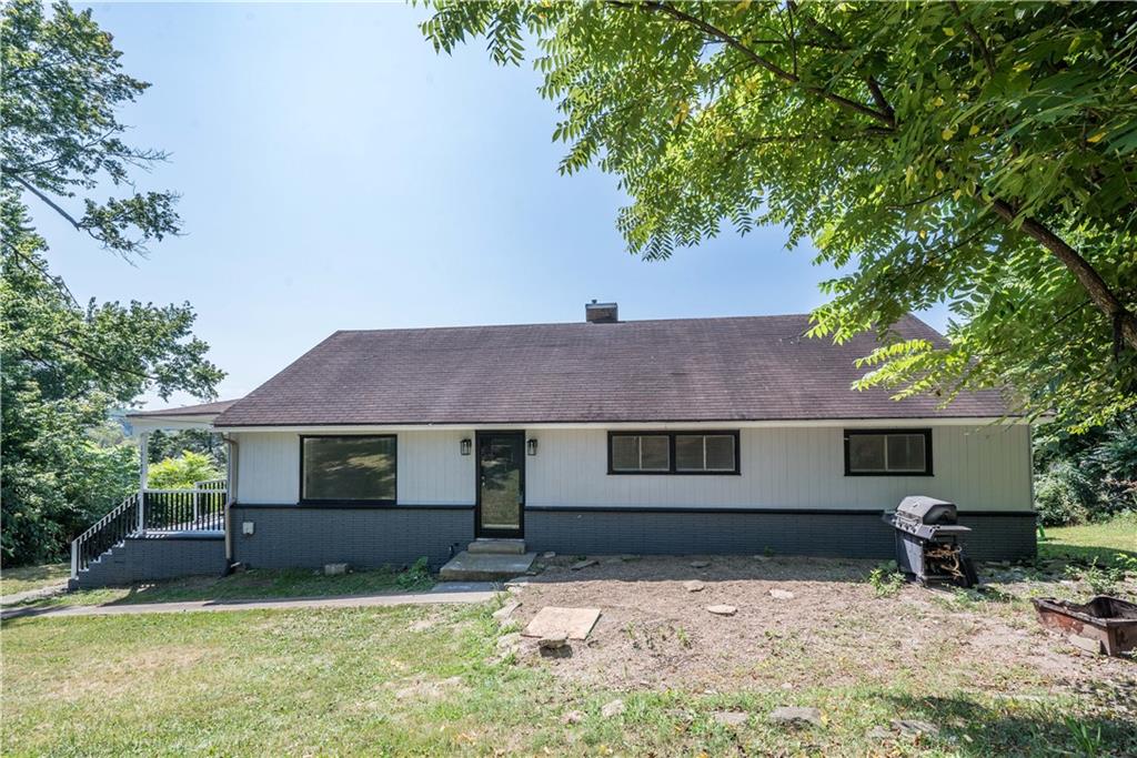 10780 Old Trail Road Irwin, PA 15642 - Photo 4 of 45 a house that has tree in front of it