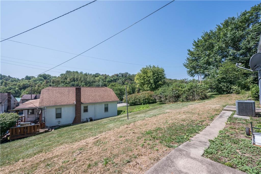 10780 Old Trail Road Irwin, PA 15642 - Photo 45 of 45 a front view of a house with a yard and garage