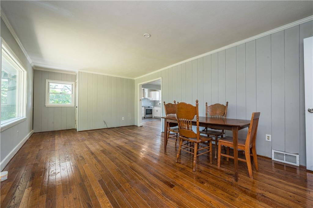 10780 Old Trail Road Irwin, PA 15642 - Photo 9 of 45 a view of a dining room with furniture and wooden floor
