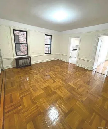 a view of empty room with windows