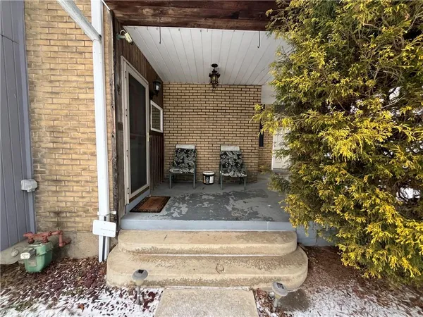 a view of a porch with a door