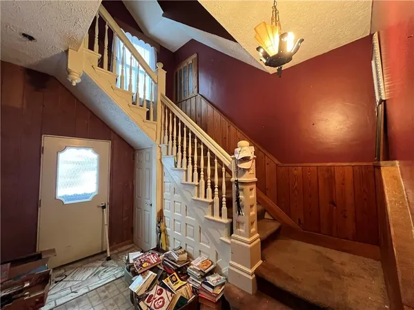 a view of balcony with furniture