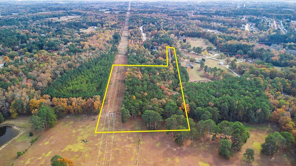 280 Dodgen Road Hampton, GA 30228 - Photo 5 of 8 an aerial view of residential houses with outdoor space and trees
