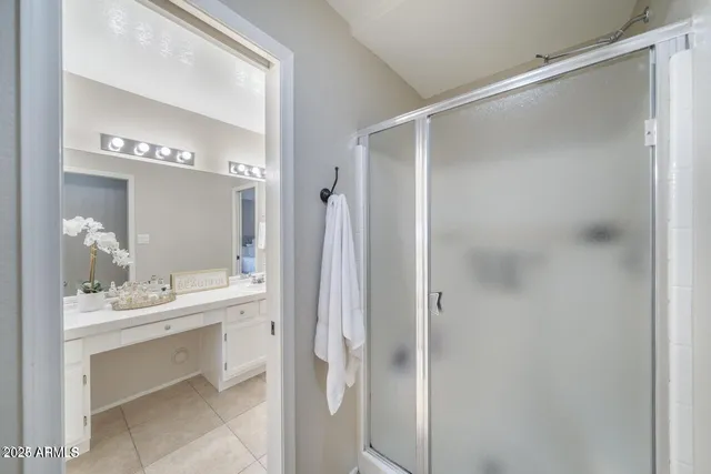 a bathroom with a sink a mirror and a bathtub