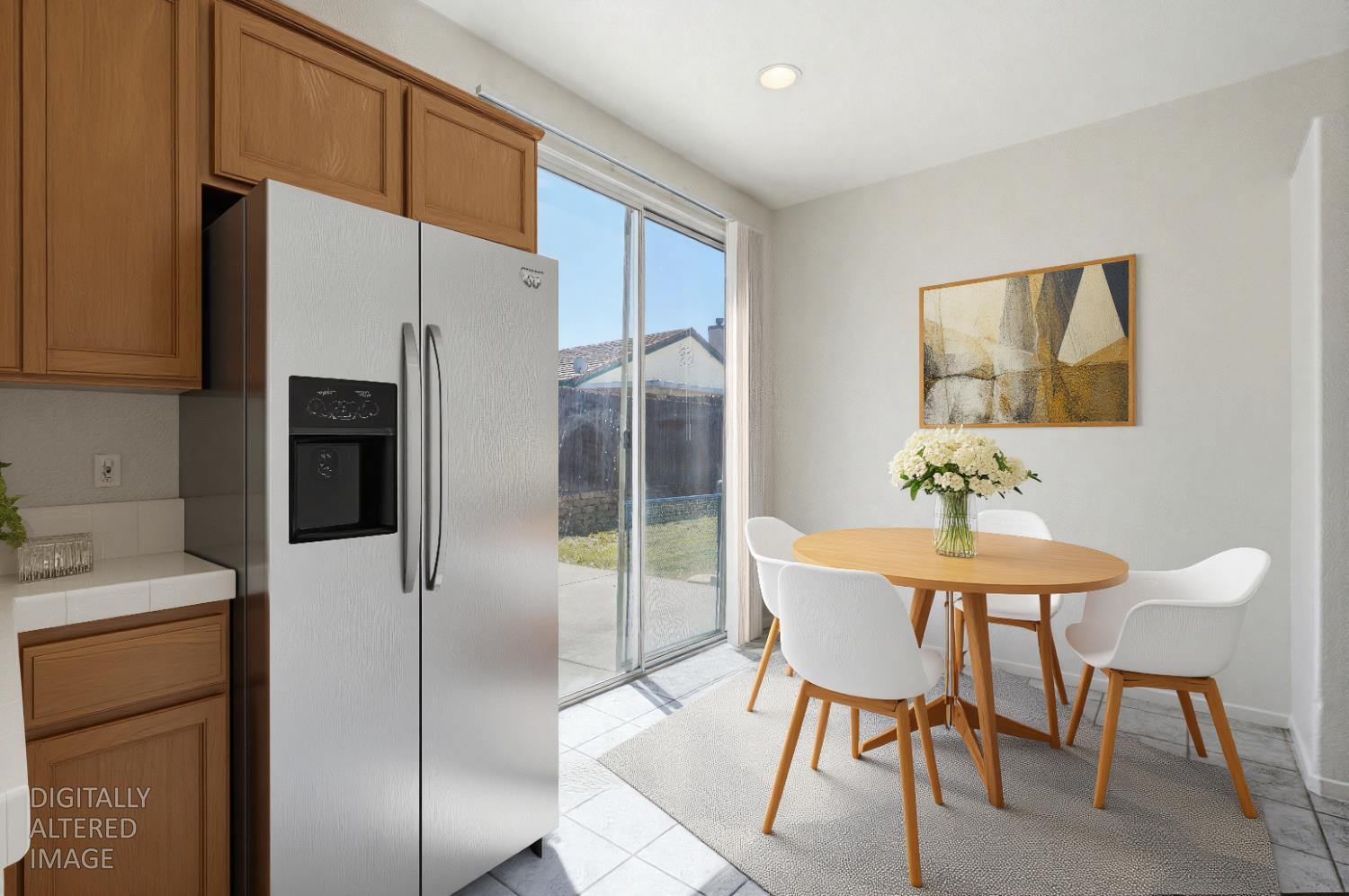 6820 Ranch House Way Citrus Heights, CA 95621 - Photo 14 of 34 Virtual generated photo- Refrigerator , chairs , table and wall art are AI generated.