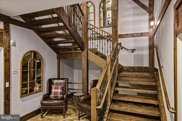 a view of walk in closet with empty room