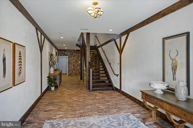 a front view of a building with glass windows and ceiling