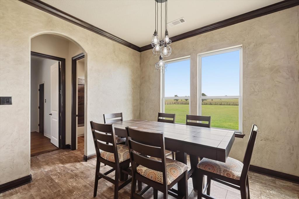 160 Vista Ridge North Decatur, TX 76234 - Photo 11 of 40 a view of a dining room with furniture window and outside view