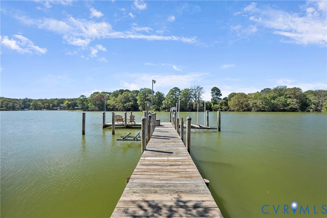447 Tranquility Road Reedville, VA 22539 - Photo 75 of 82 Private dock with wood planking and multiple pilin