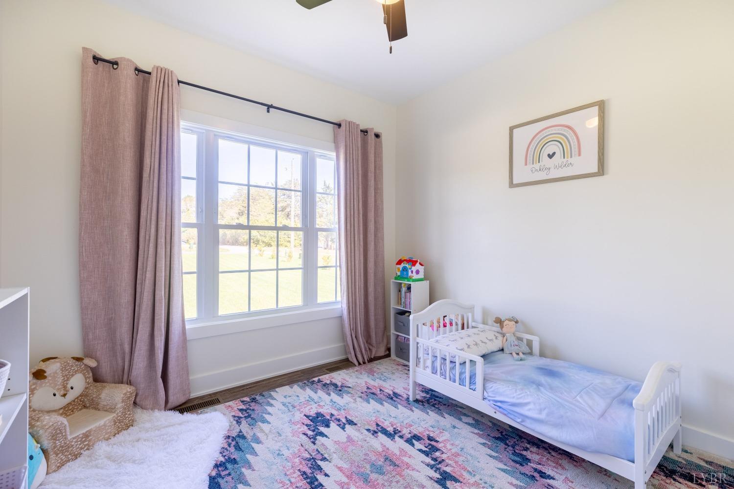 2142 Clarks Road Rustburg, VA 24588 - Photo 18 of 34 a bedroom with a bed and a window