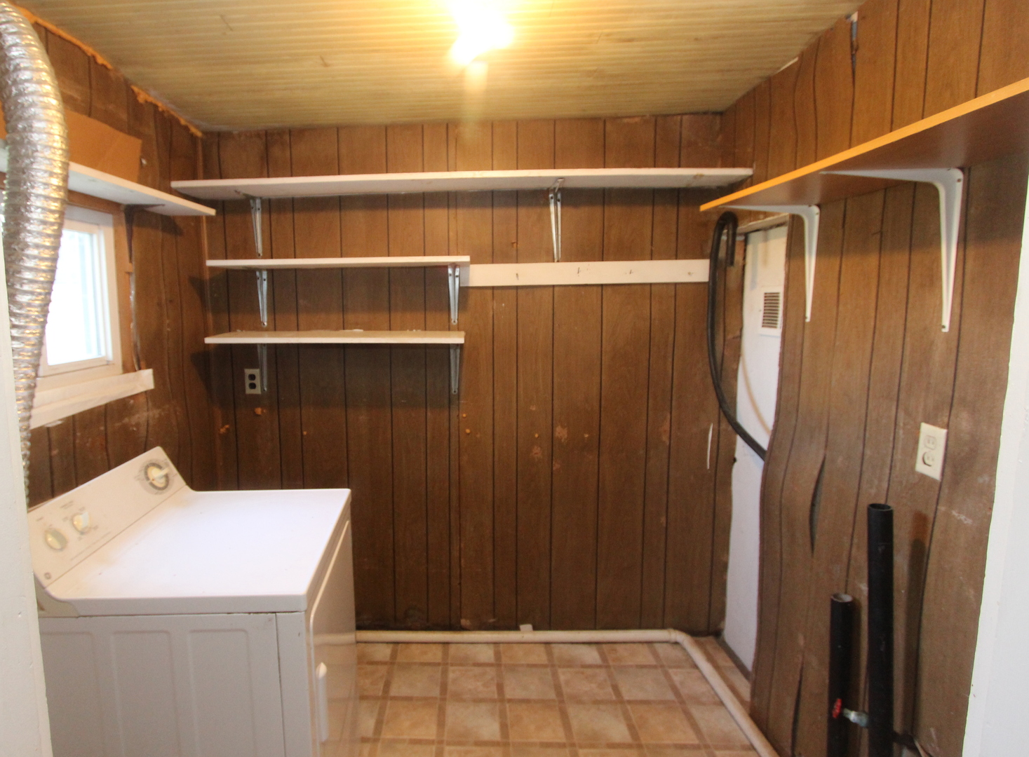 10714 Vanderkarr Road Hebron, IL 60034 - Photo 13 of 17 a view of storage and utility room with a sink