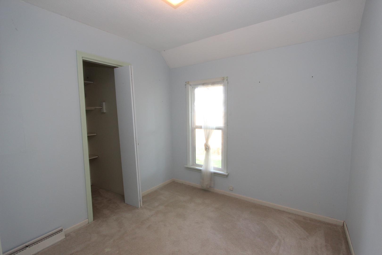 10714 Vanderkarr Road Hebron, IL 60034 - Photo 15 of 17 an empty room with windows