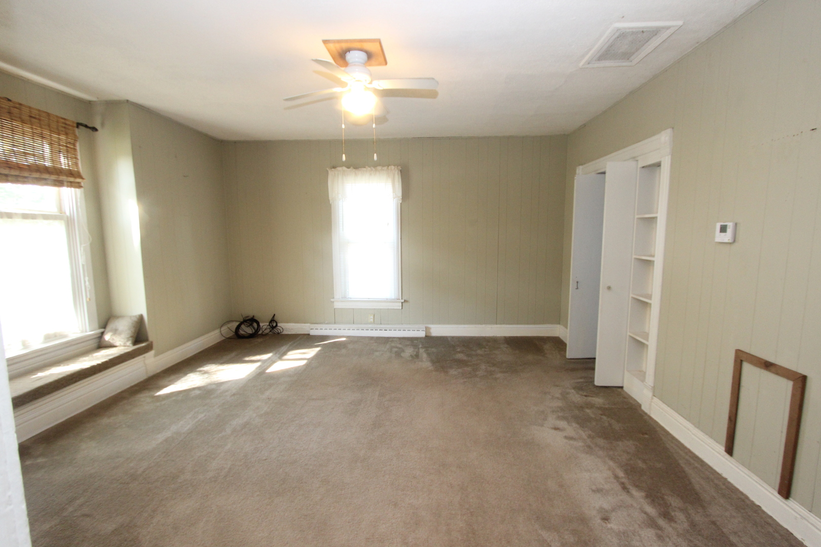 10714 Vanderkarr Road Hebron, IL 60034 - Photo 8 of 17 a view of an empty room with a window