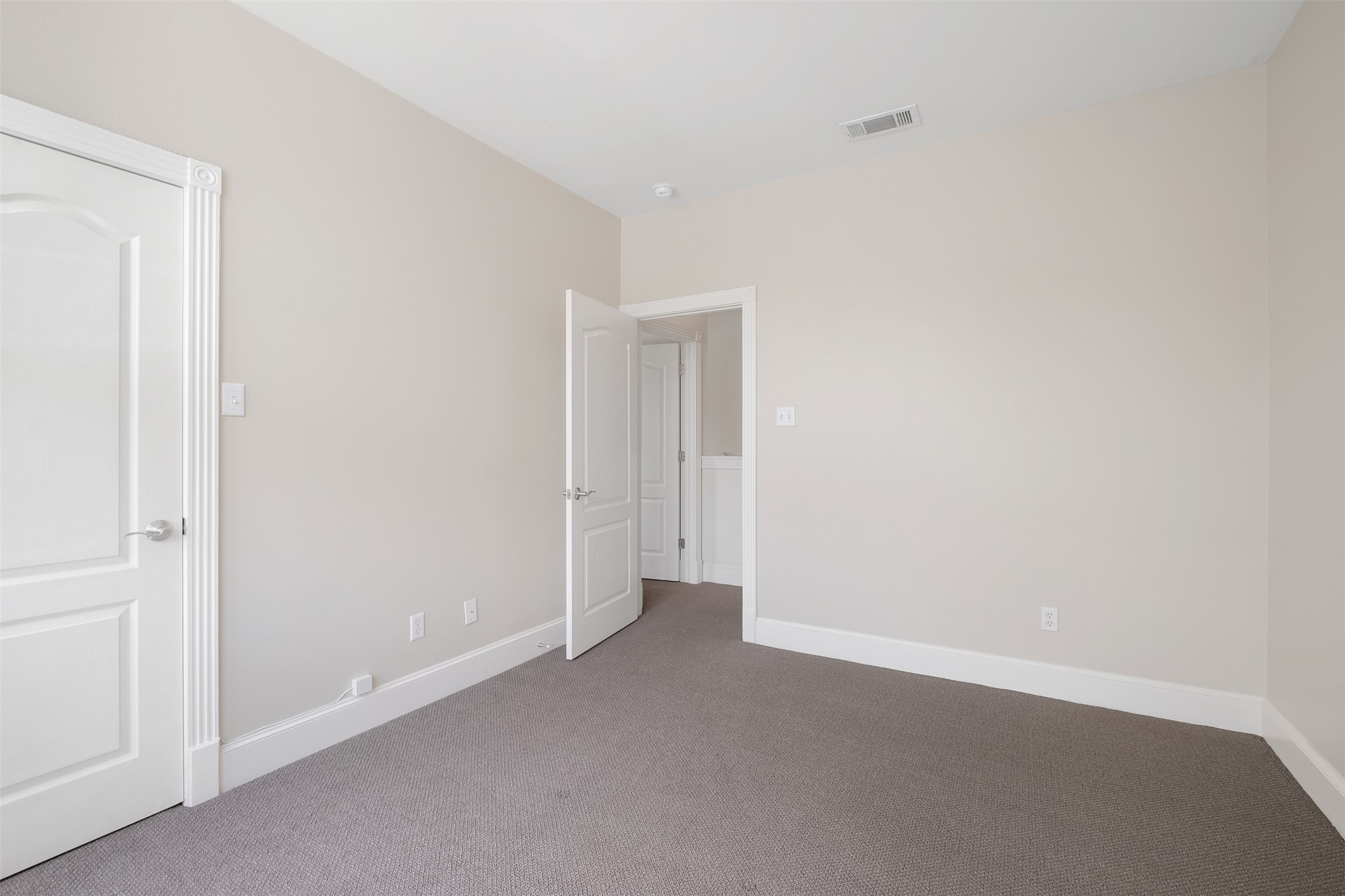 6715 Windrift Way, Unit 8 Austin, TX 78745 - Photo 20 of 24 An inviting room awaits personal touches with fresh paint and newly installed carpet.