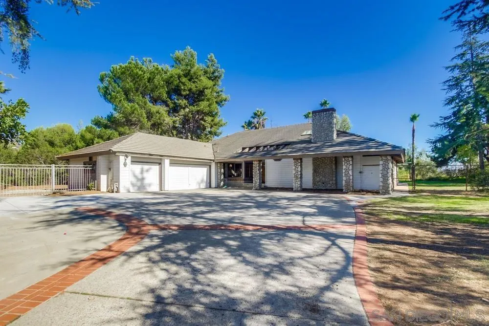 15235 Crestview Court Poway, CA 92064 - Photo 2 of 68 a front view of a house with a garden
