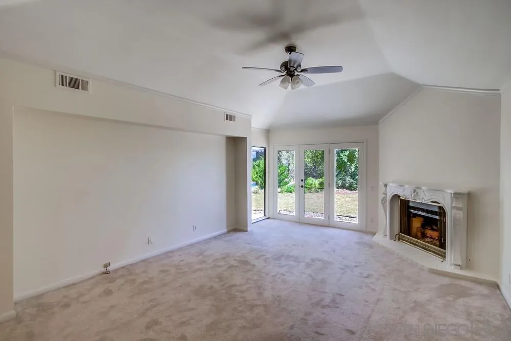 15235 Crestview Court Poway, CA 92064 - Photo 24 of 68 a view of empty room with a fireplace