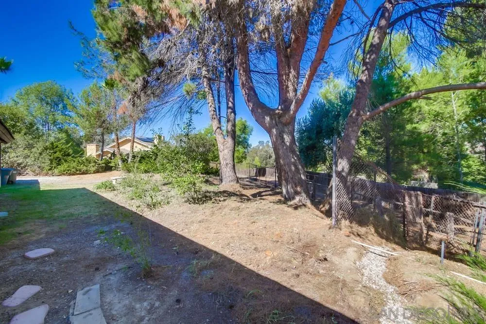 15235 Crestview Court Poway, CA 92064 - Photo 44 of 68 a view of a backyard with large trees