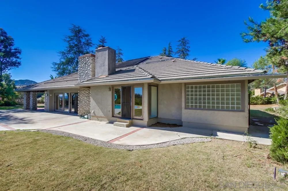 15235 Crestview Court Poway, CA 92064 - Photo 46 of 68 a front view of a house with a garden