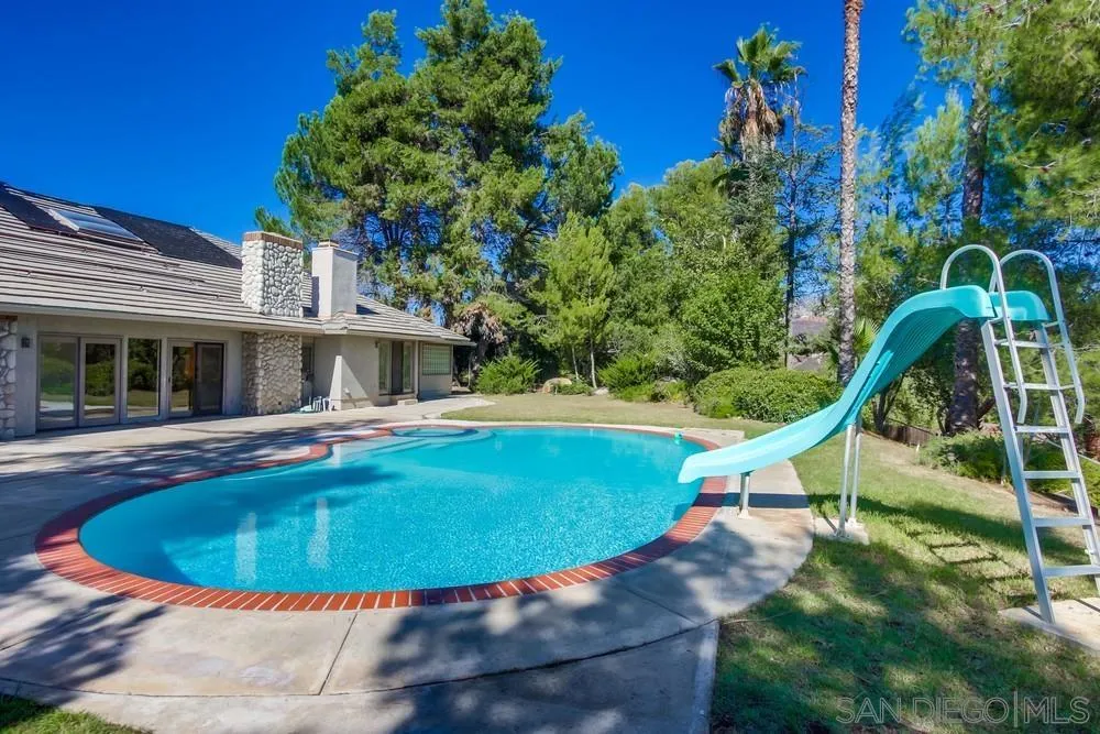 15235 Crestview Court Poway, CA 92064 - Photo 51 of 68 a view of a house with swimming pool
