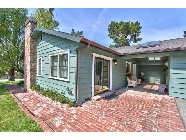 3055 Sloat Road Pebble Beach, CA 93953 - Photo 23 of 25 a front view of a house with a garden