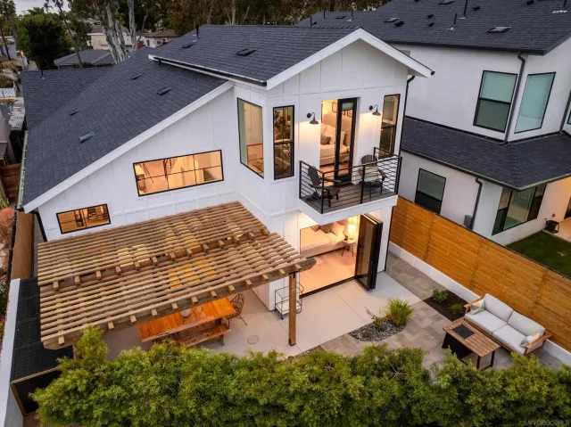 a view of a house with pool porch and furniture