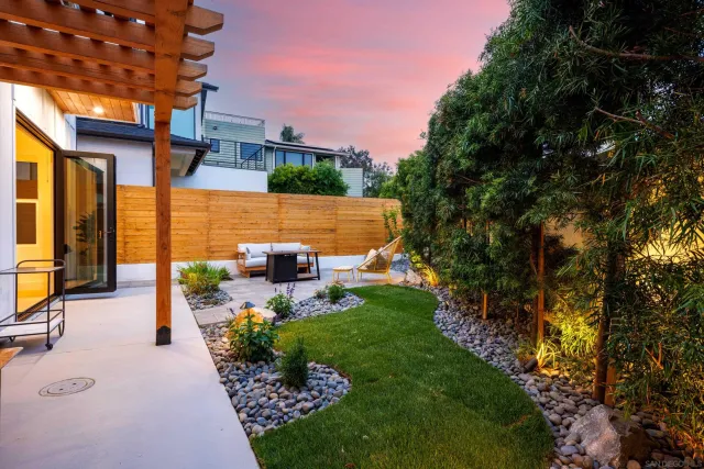 a view of a backyard with garden
