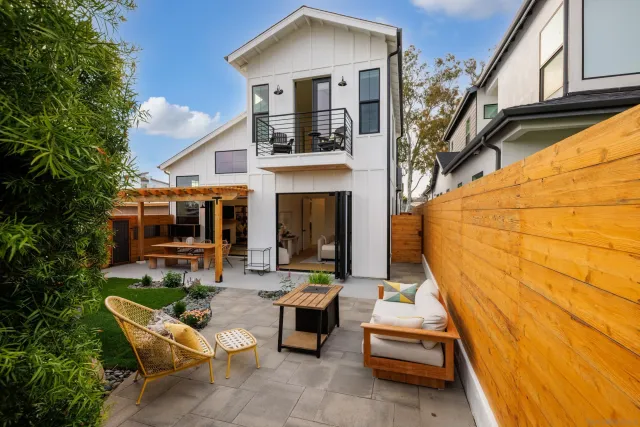 a view of house with outdoor seating space