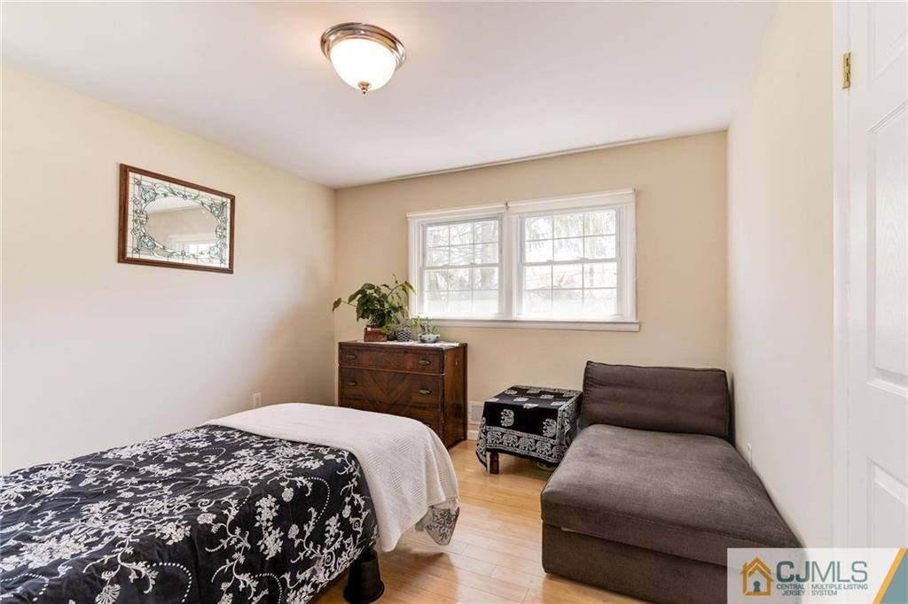 17 Wilk Road Edison, NJ 08837 - Photo 12 of 22 a bedroom with bed and a window